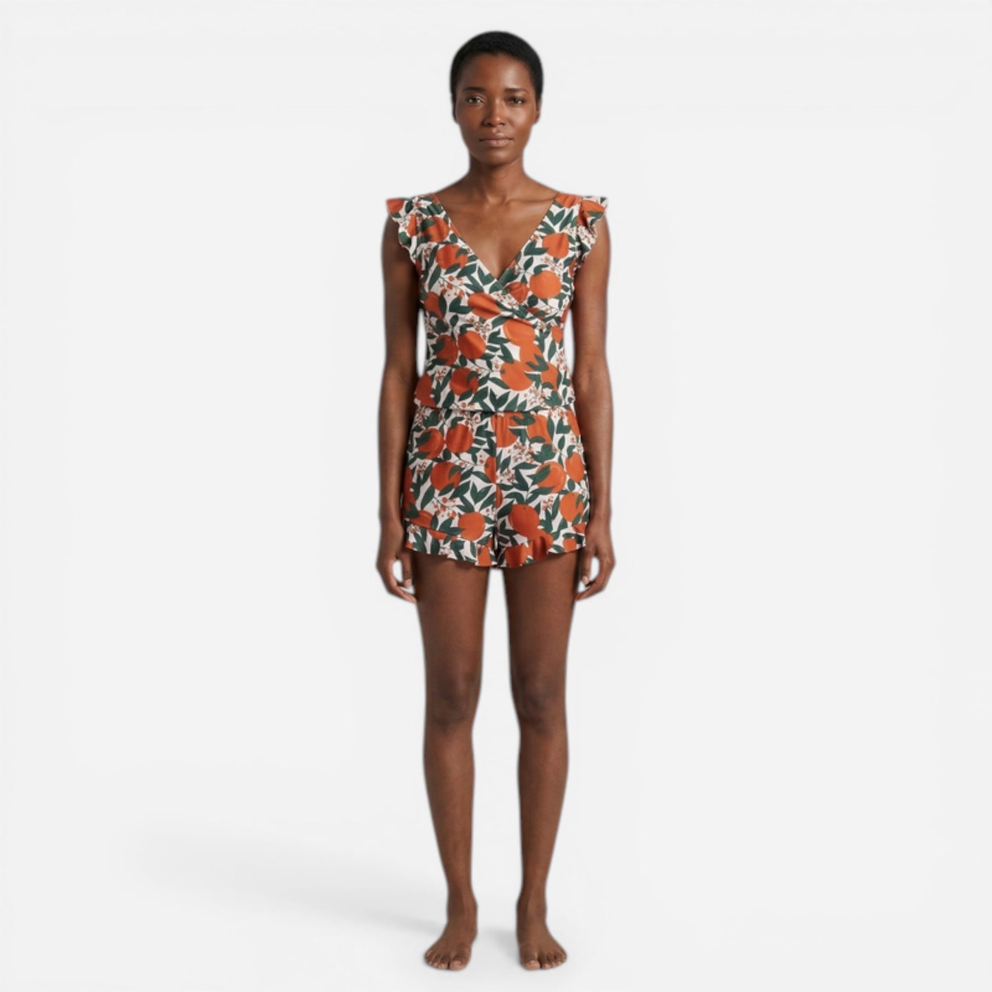 Combinaison courte femme avec volants, décolleté en V, été chic