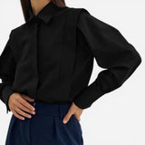 Chemise à carreaux pour femmes, boutons multiples, couleurs variées - Élégance et confort.