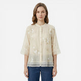 Blouse féminine douce avec broderie florale et col coréen élégant